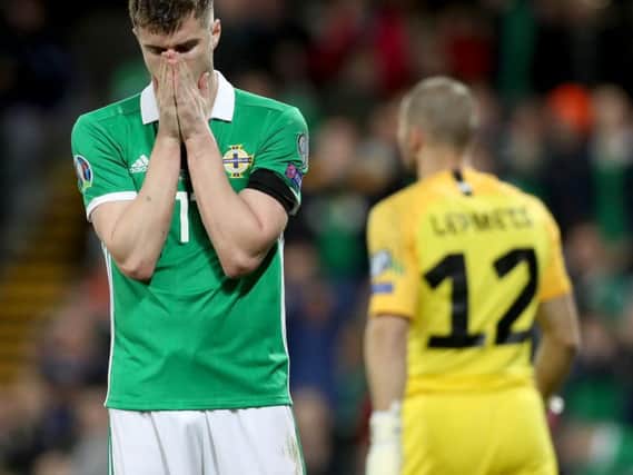 Northern Ireland's Paddy McNair after missing his chance in the first half