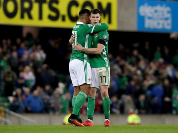 Northern Ireland players celebrate the win against Estonia