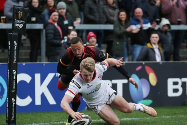 Ulster winger Rob Lyttle goes over for a try.