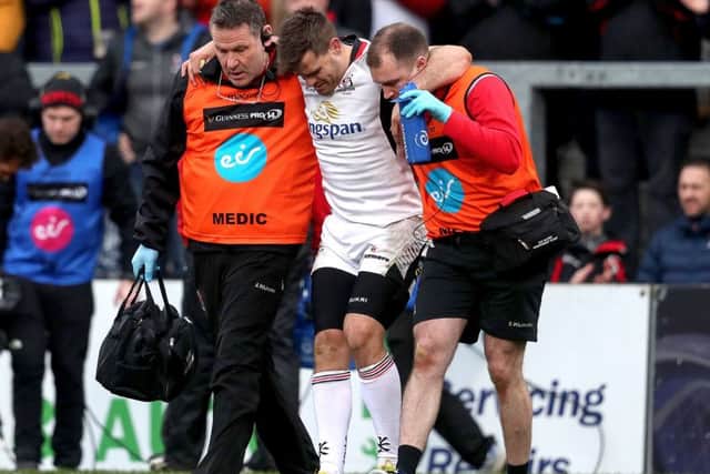 Ulster's Louis Ludik leaves the pitch injured