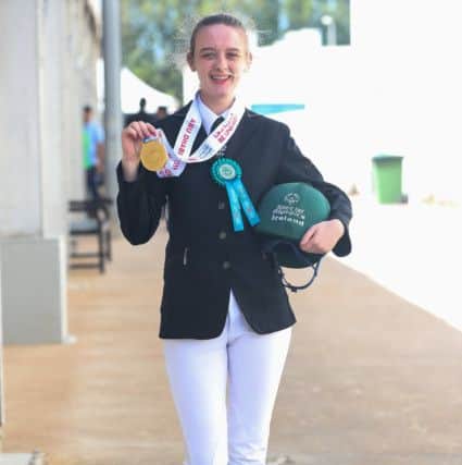 18 March 2019: There was further success for Team Irelands equestrian athletes with an incredible two gold and two silver medals secured in the English Equitation events on the fourth day of competition at the Special Olympics World Summer Games in Abu Dhabi. 18-year-old Megan McElherron from Newry, Co. Down added a gold medal to her growing haul, having scooped a silver medal in the Working Trials event on Saturday. Pictured: Megan celebrates her win. Picture by Ricardo Guglielminotti. *** NO REPRODUCTION FEE ***