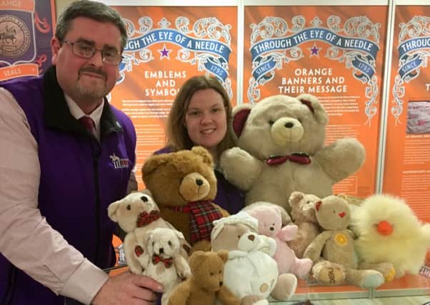 Museum of Orange Heritage staff, curator Jonathan Mattison and service officer, Sarah Cameron, show off some of the teddy bears which will be on public display as part of the upcoming Bible festival