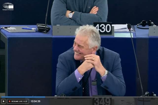 Jim Nicholson acknowledges applause from other MEPs after speaking in the plenary session at the European Parliament for perhaps the last time after his 30 years there