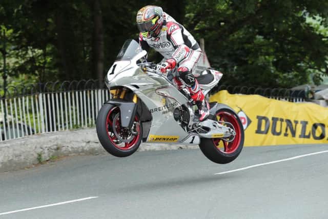 Morecambe star John McGuinness completed a parade lap on the Norton at last year's Isle of Man TT.