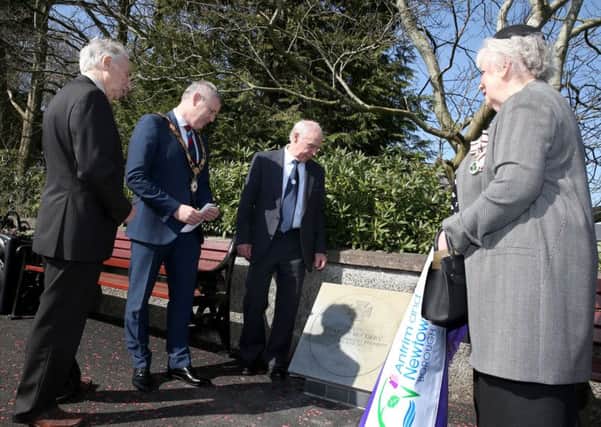 Mayor of Antrim and Newtownabbey, Councillor Paul Michael and Lord Lieutenant of Co Antrim, Joan Christie are pictured with Wallace and Edmund McCurry as they unveiled the memorial to Pte Charles McCurry. Picture: Stephen Davison/Pacemaker