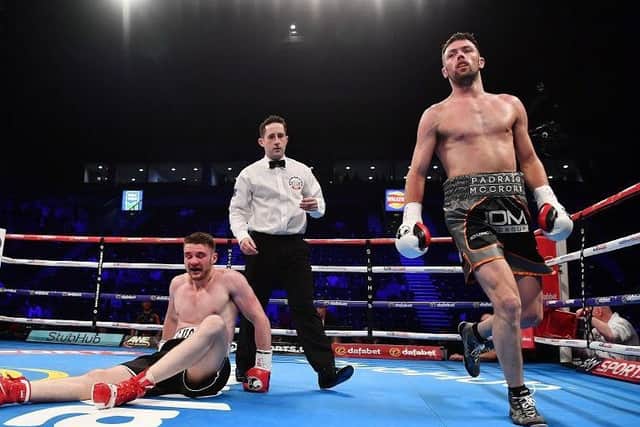 Padraig McCrory knocks Jacob Lucas to the canvas