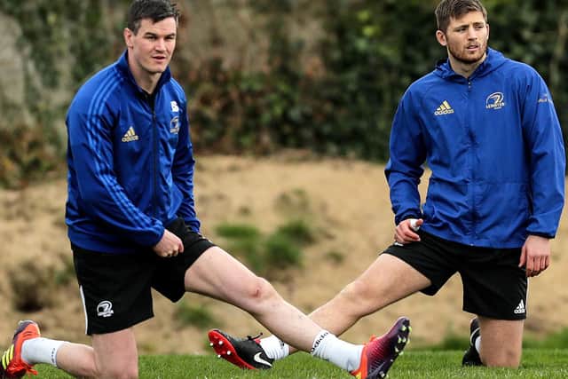 Leinster's Johnny Sexton (left) has been ruled out of the Champions Cup tie against Ulster and is replaced by Ross Byrne (right)