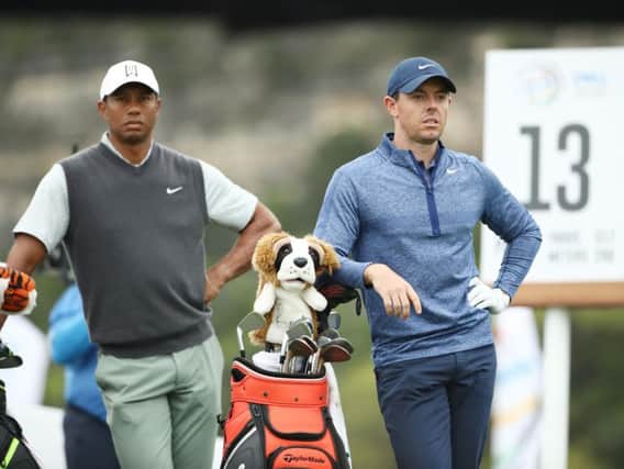 Rory McIlroy and Tiger Woods during the their quarter-final matchplay tie at Austin