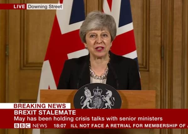 Theresa May speaking from Downing Street last night