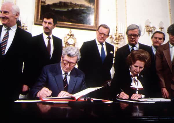 Irish Premier Garret Fitzgerald and UK prime minister Margaret Thatcher sign the Anglo-Irish Agreement at Hillsborough Castle in 1985. "Even after the agreement, the Irish state failed to extradite IRA murderers"