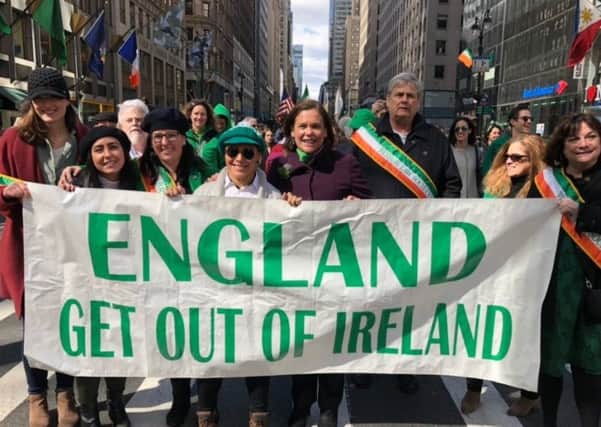 Mary Lou McDonald behing the controversial banner. Terry Wright said: "There is no strategic hidden agenda in bringing a genuine concern arising from the event on St Patrick's Day to your attention and it is my anticipation, given your response, that doing so will contribute to deeper understanding"