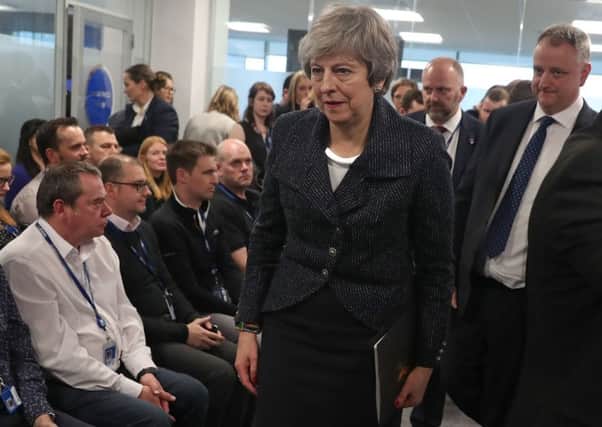 Prime Minister Theresa May arriving to deliver a speech at insurance firm Allstate in Belfast on February 5, 2019