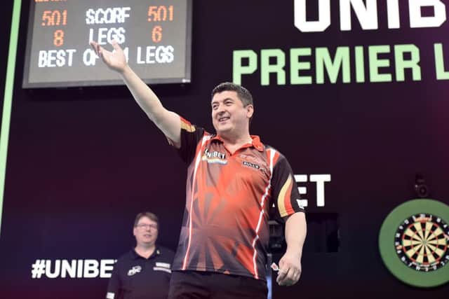4/4/19: Mensur Suljovic celebrates after beating James Wade during the Unibet Premier League Darts at the SSE Arena, Belfast. Picture: Michael Cooper