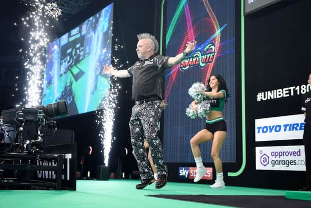4/4/19: Peter Wright in action against Michael Smith during the Unibet Premier League Darts at the SSE Arena, Belfast. Picture: Michael Cooper