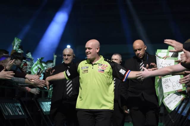 4/4/19: Michael van Gerwen in action against Gerwyn Price during the Unibet Premier League Darts at the SSE Arena, Belfast. Picture: Michael Cooper