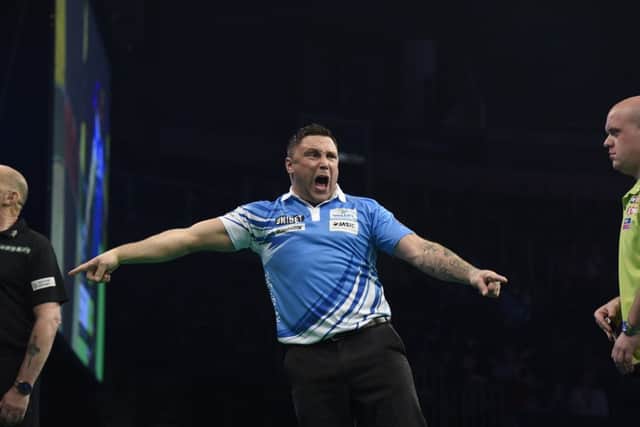 4/4/19: Gerwyn Price in action against Michael van Gerwen during the Unibet Premier League Darts at the SSE Arena, Belfast. Picture: Michael Cooper