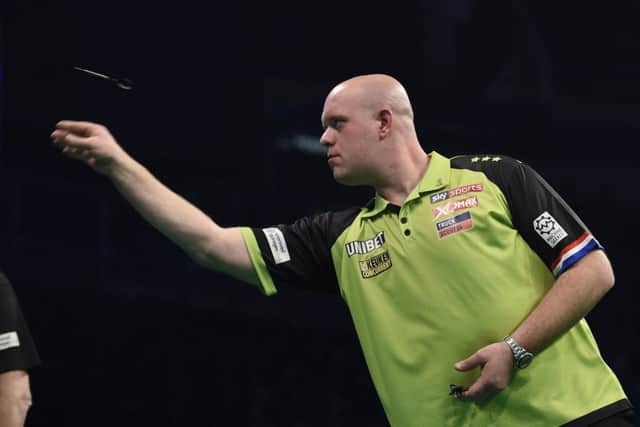 4/4/19: Michael van Gerwen in action against Gerwyn Price during the Unibet Premier League Darts at the SSE Arena, Belfast. Picture: Michael Cooper