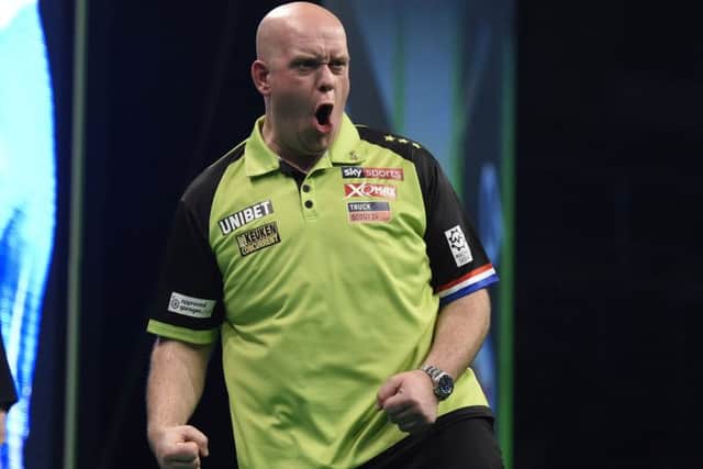 4/4/19: Michael van Gerwen in action against Gerwyn Price during the Unibet Premier League Darts at the SSE Arena, Belfast. Picture: Michael Cooper