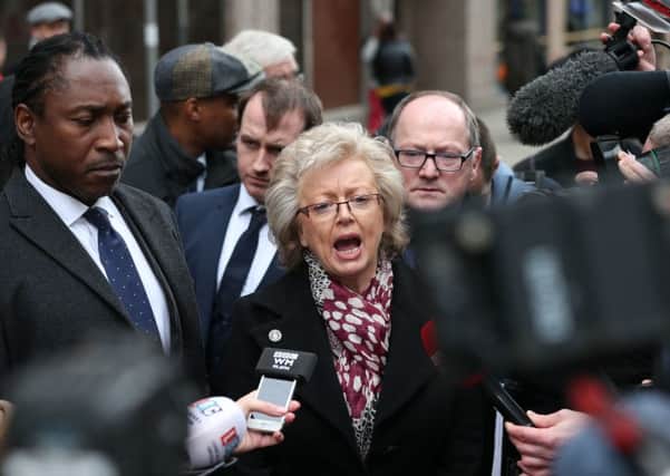 Julie Hambleton (centre) speaks to the media outside the Civil Justice Centre in Birmingham after the conclusion of the Birmingham Inquests. Photo: Aaron Chown/PA Wire