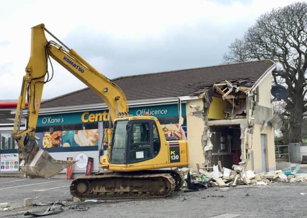 The scene in Dungiven, Co Londonderry on Sunday after a cash machine was ripped from a wall in the latest of a spate of ATM thefts. Pic: David Young/PA Wire