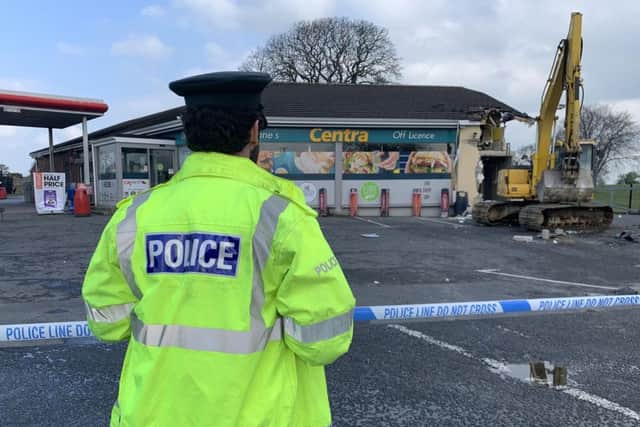 A police officer at the scene of the latest ATM digger theft just outside Dungiven in Co Londonderry