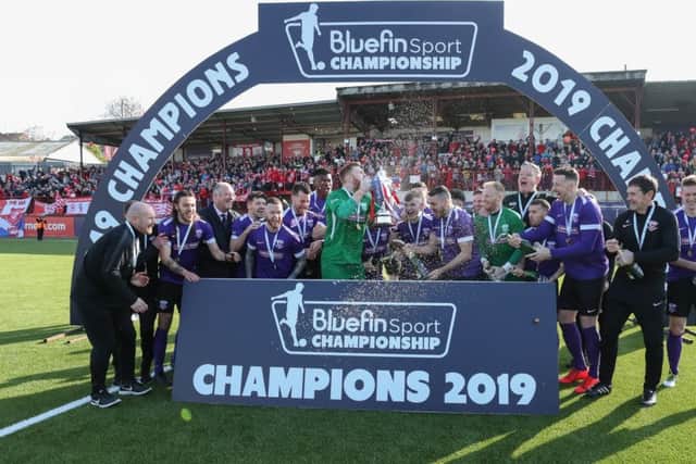 Larne are presented with the Championship trophy following their victory over Portadown.
Photo Desmond Loughery/Pacemaker Press