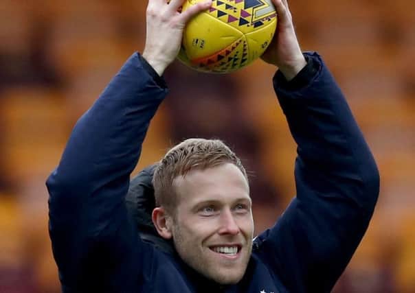 Rangers' Scott Arfield celebrates his hat-trick after the Ladbrokes Scottish Premiership match at Fir Park. Pic by PA.