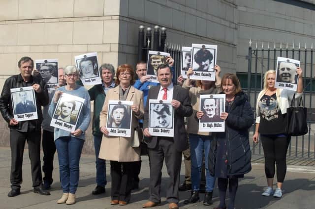 Relatives of some of the 10 Ballymurphy victims outside court before Mondays hearing