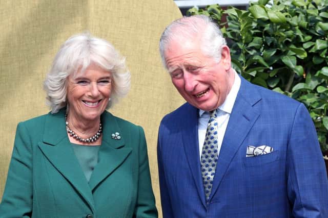 The Prince of Wales and the Duchess of Cornwall during a tour of the Visitor Centre and the Walled Garden at the reopening of Hillsborough Castle and gardens in Northern Ireland.