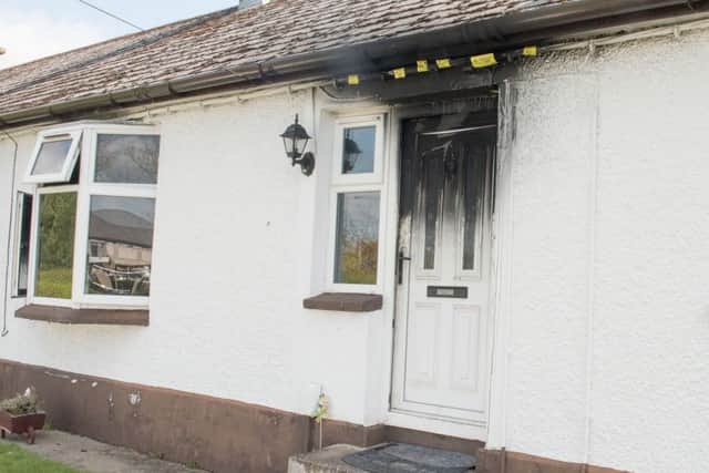 A woman in her 60s has been treated for shock after an arson attack in Londonderry last night