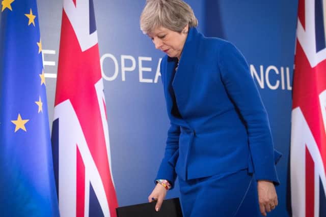 Prime Minister Theresa May holds a news conference after the European Council in Brussels where European Union leaders met to discuss Brexit. Photo: Stefan Rousseau/PA Wire