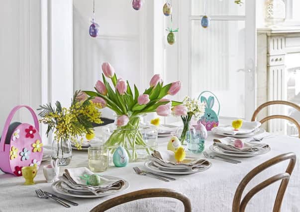 Undated Handout Photo of Create A Stunning Centrepiece  Spotty/Floral Egg Hanging Decorations, £1.49 each; Felt Flower Egg Basket, £4.99; Chick Egg Cup, £4.99; Bunny Head Egg Cup, £4.99; Wax Egg Candles, £2.99; Coloured Chenille Chicks, £3.99; Felt Bunny Egg Basket, £2.99, Dobbies. See PA Feature INTERIORS Easter. Picture credit should read: Dobbies/PA Photo/Handout. WARNING: This picture must only be used to accompany PA Feature INTERIORS Easter. WARNING: This picture must only be used with the full product information as stated above.