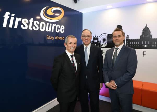 Sean Canning of Firstsource Solutions with Mark Slaughter, Department for International Trade and Kieran Long, Firstsource Solutions