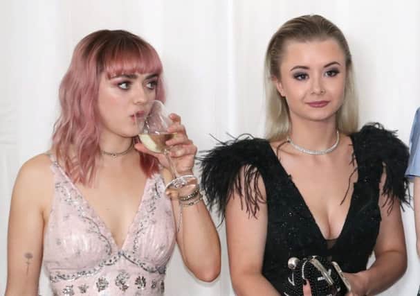 Maisie Williams (left) and Kerry Ingram attending the Game of Thrones UK premiere, held at Waterfront Hall, Belfast. Pic: Liam McBurney/PA Wire