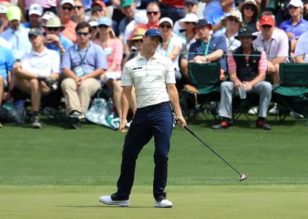 Rory McIlroy reacts on the second hole during the second round of the Masters at Augusta