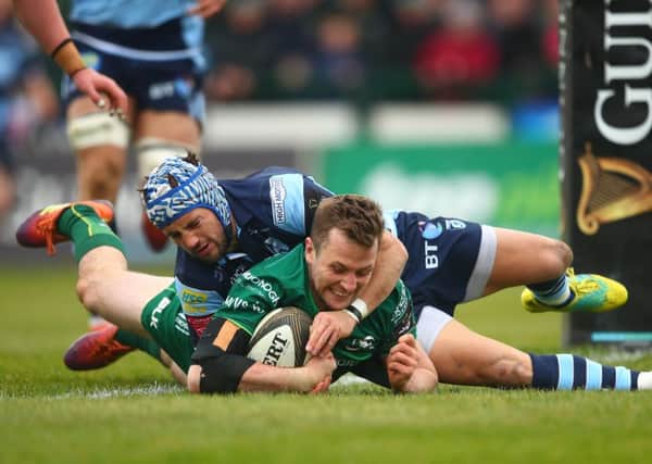 Connacht's Jack Carty scores a try despite Matthew Morgan of Cardiff Blues