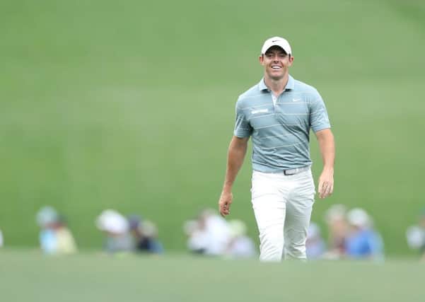 Rory McIlroy of Northern Ireland walks on the fifth hole during the third round of the Masters at Augusta National Golf Club