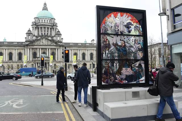 Tourism Ireland and Tourism NI unveil exciting new Game of Thrones campaign. A giant stained glass window was unveiled today opposite the main entrance of Belfast City Hall. 
Picture By: Arthur Allison. Pacemaker.