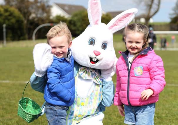 The sun was shining but it was chilly at Ballymoney Spring Fair at the weekend, where Daniel and Maeve enjoyed some Easter-themed fun. Pic: Steven McAuley/McAuley Multimedia