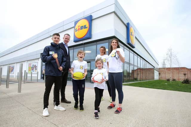 Rhys McClenaghan, Conor Boyle, Regional Director for Lidl NI, Leo Cullen, Ellie McGuigan, Leah McCourt and Bethany Firth visited the Lidl Connswater store to launch the programme.