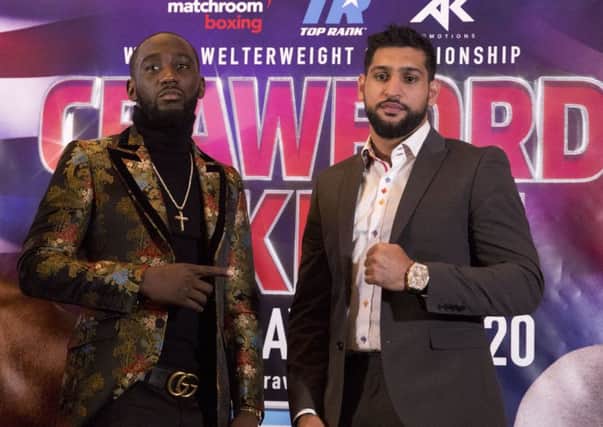 Terence Crawford (left) and Amir Khan