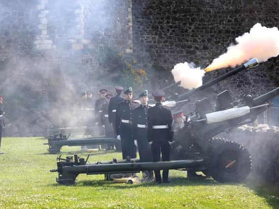 Carrickfergus Castle was the perfect backdrop for the 21-gun salute.  Picture: Paul Faith
