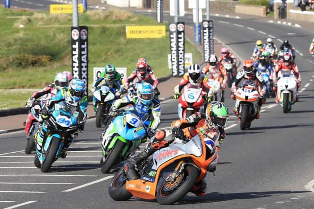 Martin Jessopp leads the Supersport pack into York Corner. Both Supersport races were won by Alastair Seeley on the EHA Racing Yamaha last year.