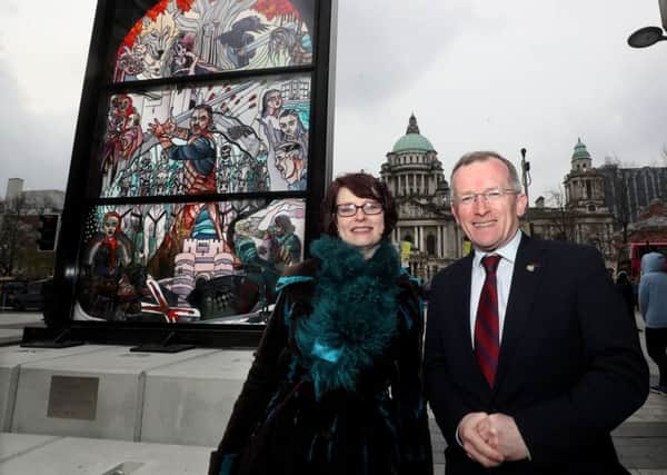 Bangor-based artist Debra Wenlock and Niall Gibbons, CEO of Tourism Ireland, at the unveiling of the first Glass of Thrones panel in Belfast city centre