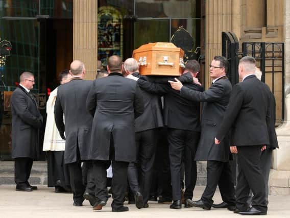 Lyra McKee's coffin is carried into St Anne's Cathedral. Pic: Press Eye
