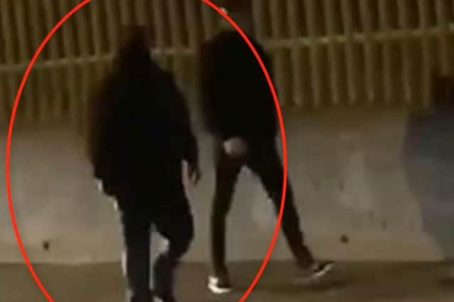 Police believe the man on the left who is circled in red is the individual responsible for killing Lyra McKee. (Video/Photo: P.S.N.I.)