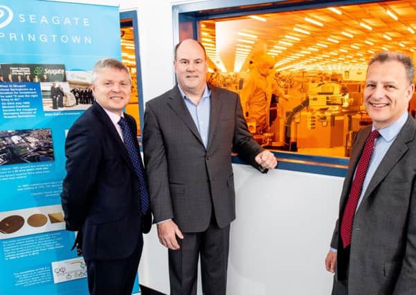 Noel Lavery, permanent secretary at the Department for the Economy with Seagate CEO Dave Mosley and Jeremy Fitch, Executive Director at Invest NI
