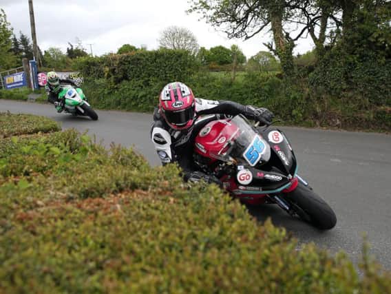 Adam McLean leads Derek McGee during Supersport practice at the KDM Hire Cookstown 100 on Friday. Picture: Stephen Davison/Pacemaker Press.