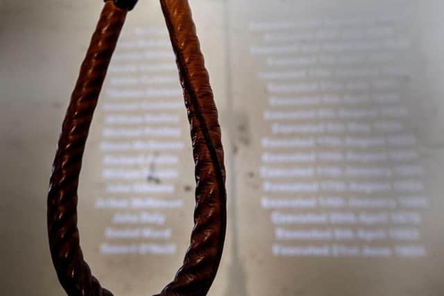 File photo dated 17/04/19 of a hangman noose with a list of projected names of those executed at Crumlin Road Gaol in Belfast which is part of a new Troubles themed tour.