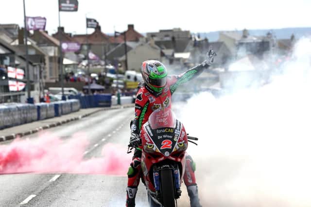 Glenn Irwin celebrates his Superbike double at the North West 200 in 2018.
